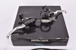 NOS/NIB Shimano Deore LX #ST-M560 STI 3x7-speed SIS Rapidfire gear shifting SRS brake lever Set from the 1990s