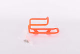 NOS neon orange Wheeler MTB water bottle cage from the 1990s