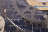 NOS/NIB Shimano 600 New EX #6207 / Deore XT #M700 Biopace Chainring #1474401 in 44 teeth and 110 BCD for triple crank set #FC-6206 from 1984