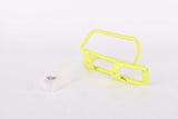 NOS neon yellow Wheeler MTB water bottle cage from the 1990s