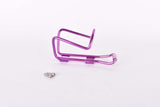 NOS purple anodized Wheeler water bottle cage from the 1990s