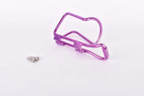 NOS purple anodized Wheeler water bottle cage from the 1990s