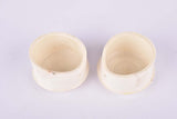 White Benotto handlebar end plugs