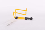 NOS yellow Elite water bottle cage