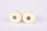 White Milremo handlebar end plugs