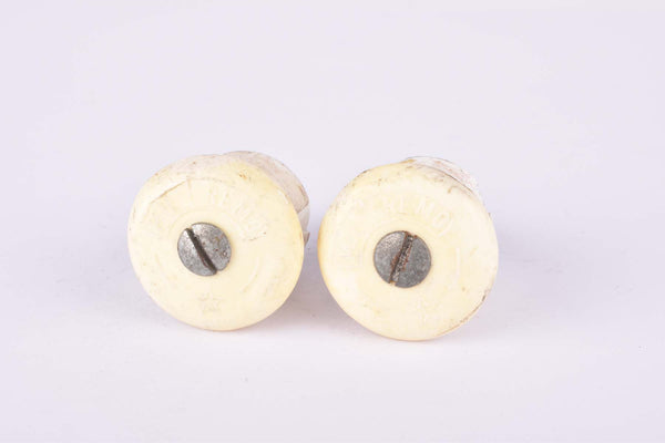 White Milremo handlebar end plugs