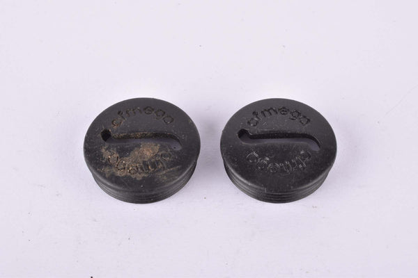 Black Ofmega plastic crank set dust caps