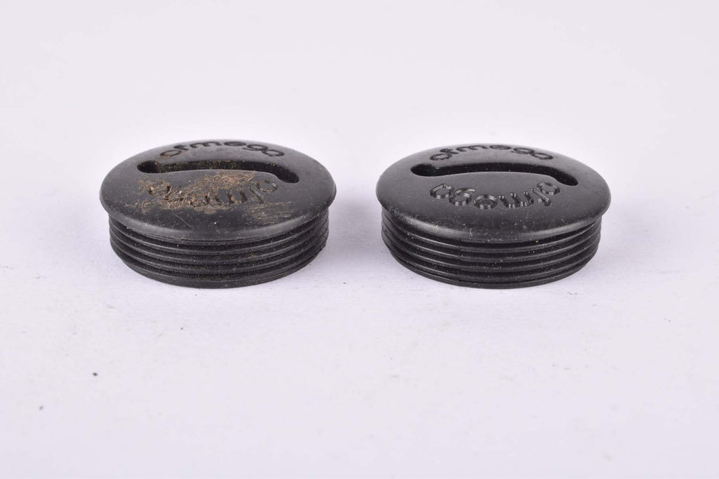 Black Ofmega plastic crank set dust caps