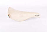White Puch labled Selle San Marco Concor Supercorsa Laser Saddle from the 1980s - 1990s