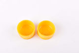 Yellow Benotto handlebar end plugs