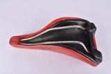 Red Benotto labled Selle San Marco Laser Saddle from the 1980s / 1990s