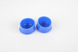Blue Benotto handlebar end plugs