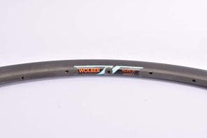 NOS Wolber Profil 20 dark anodized single tubular Rim for triathlon or timetrial in 26"/571mm with 32 holes from the 1980s