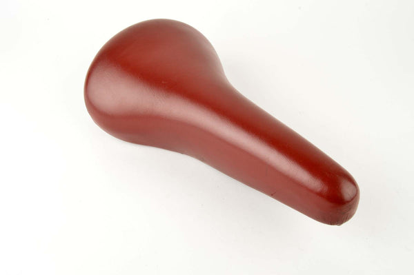 Red synthetic leather saddle from 1985