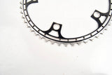 Black anodized and drilled chainring with 52 teeth for Campa cranks from the 80s